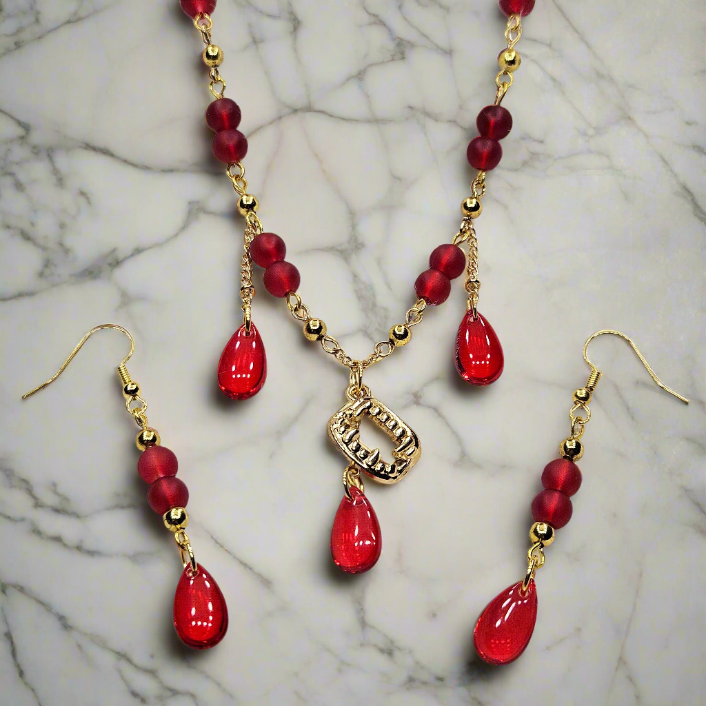 Taste for Blood Vampire Fang Necklace and Earrings with Red Glass Blood Drops Set in Gold