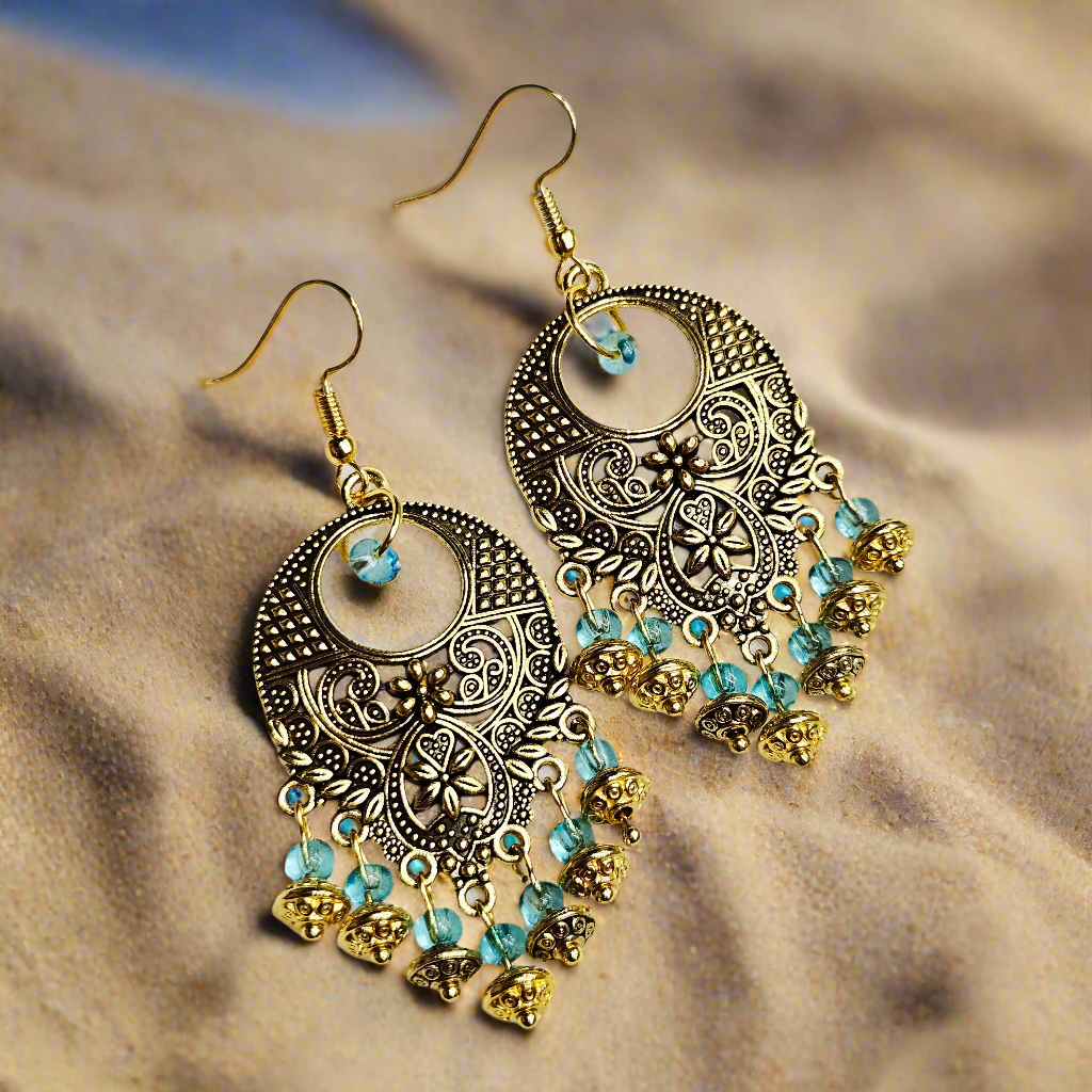 Bali Style Brassy-Gold Chandelier Earrings in Light Blue glass