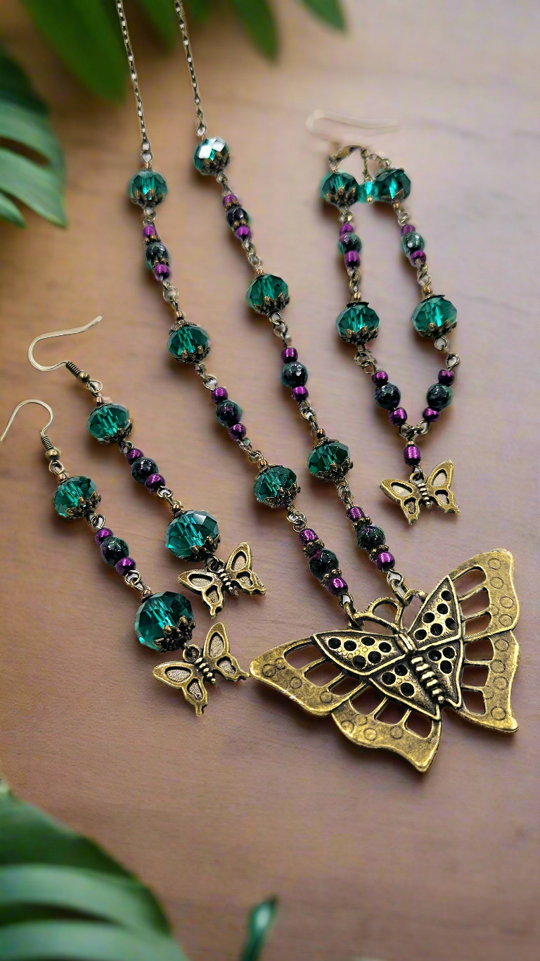Large Brass Butterfly Pendant Necklace, Earrings & Bracelet with Emerald Austrian Crystals and Purple Accent Beads
