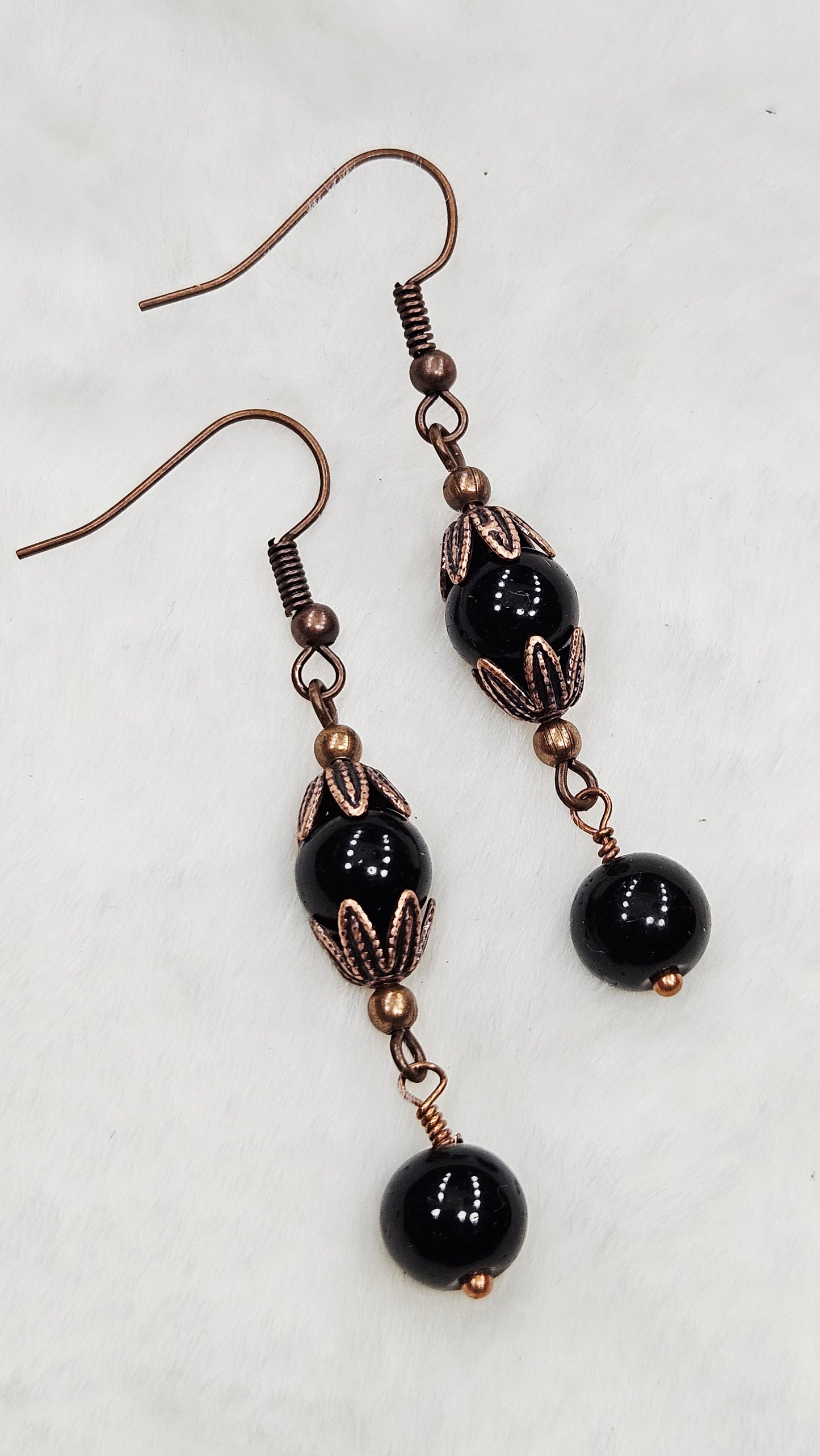 Antique Copper Leaf Cap Dangle Earrings with Black Glass
