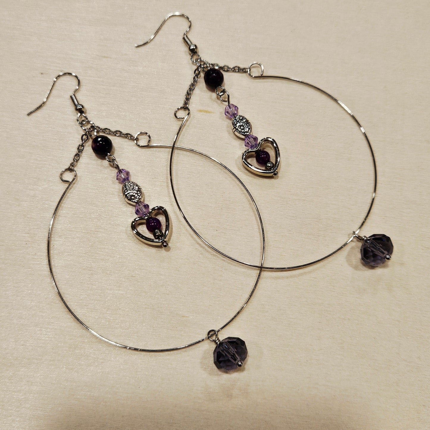 Large Silver Hoop Earrings with Tiny Purple Accents and Heart Dangles