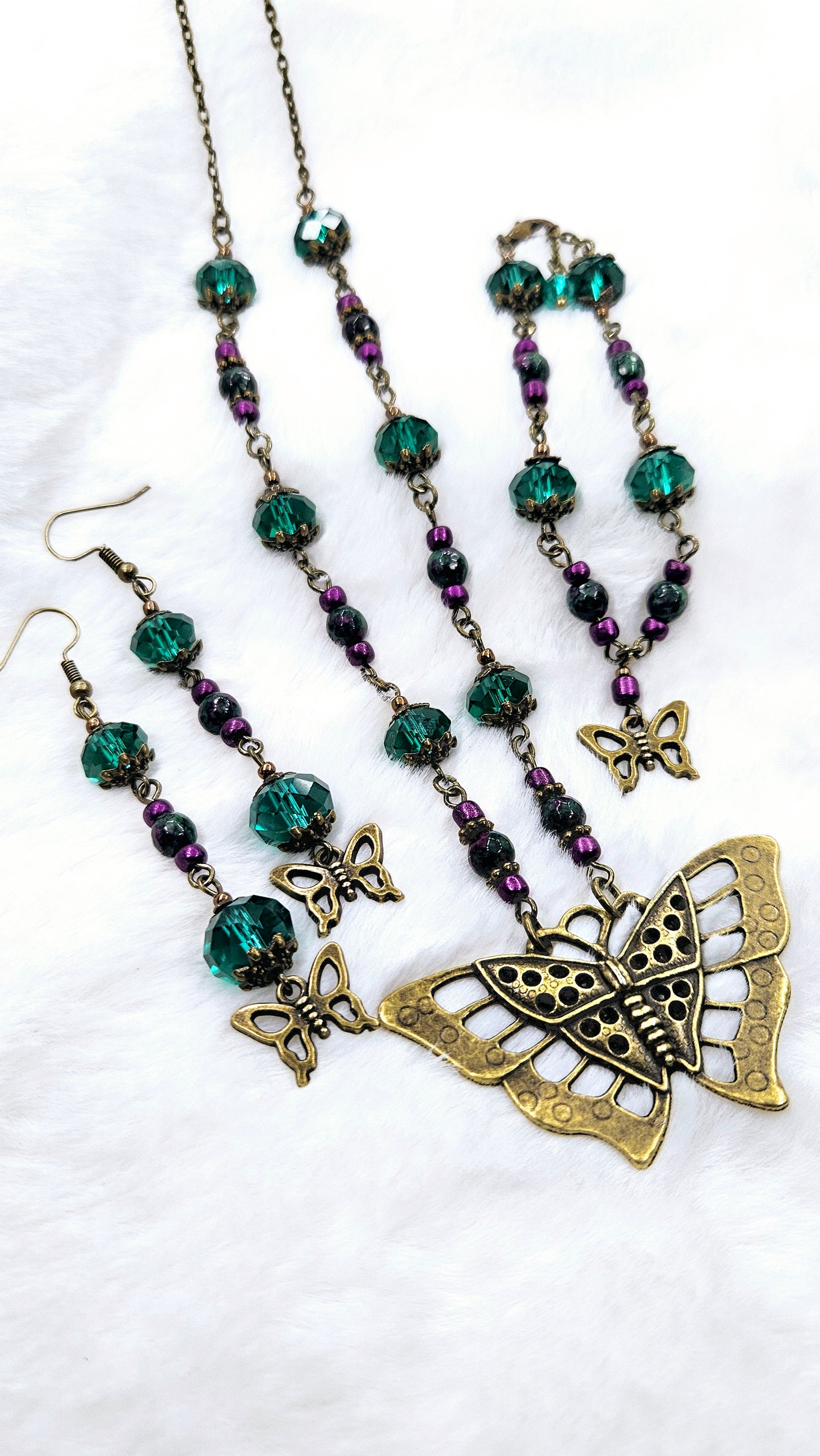 Large Brass Butterfly Pendant Necklace, Earrings & Bracelet with Emerald Austrian Crystals and Purple Accent Beads