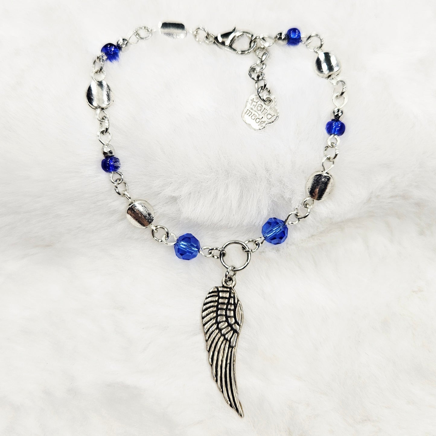 Silver Wing Charm Bracelet with Blue Crystals