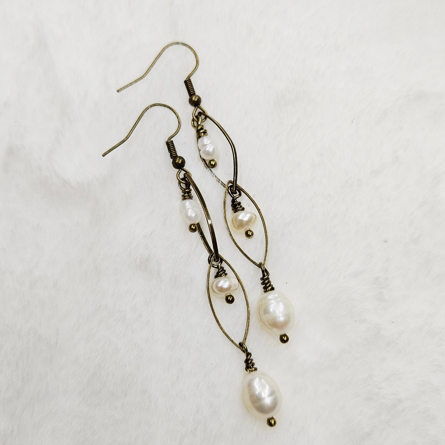 Long Antiqued Brass Oval Links with a Trio of Creamy Freshwater Pearl Dangles