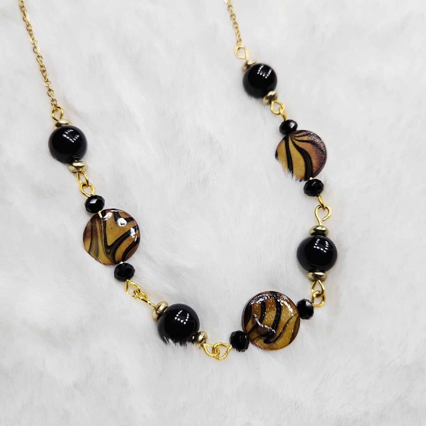 Beautifully Bold Black and Brown Pearly Shell Necklace