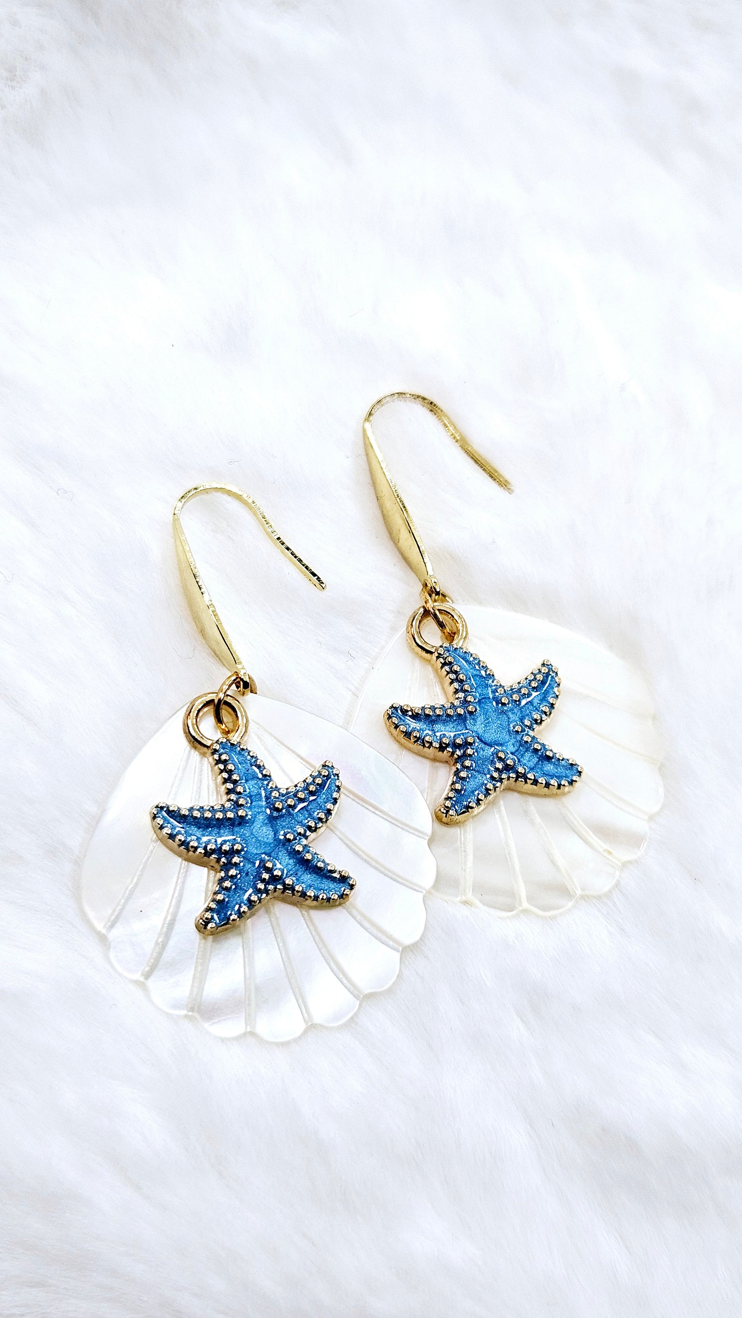 Calming Clams & Blue Starfish: Pearlescent Clam Shells with Blue Starfish Charms Dangle Earrings
