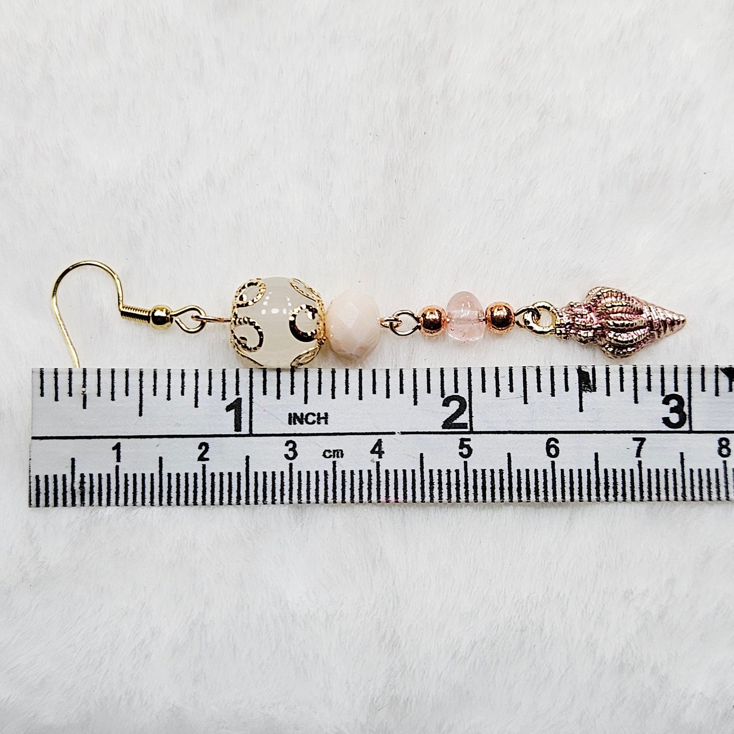 Gold and Rose Gold Conch Shell Earrings with Pink Stones