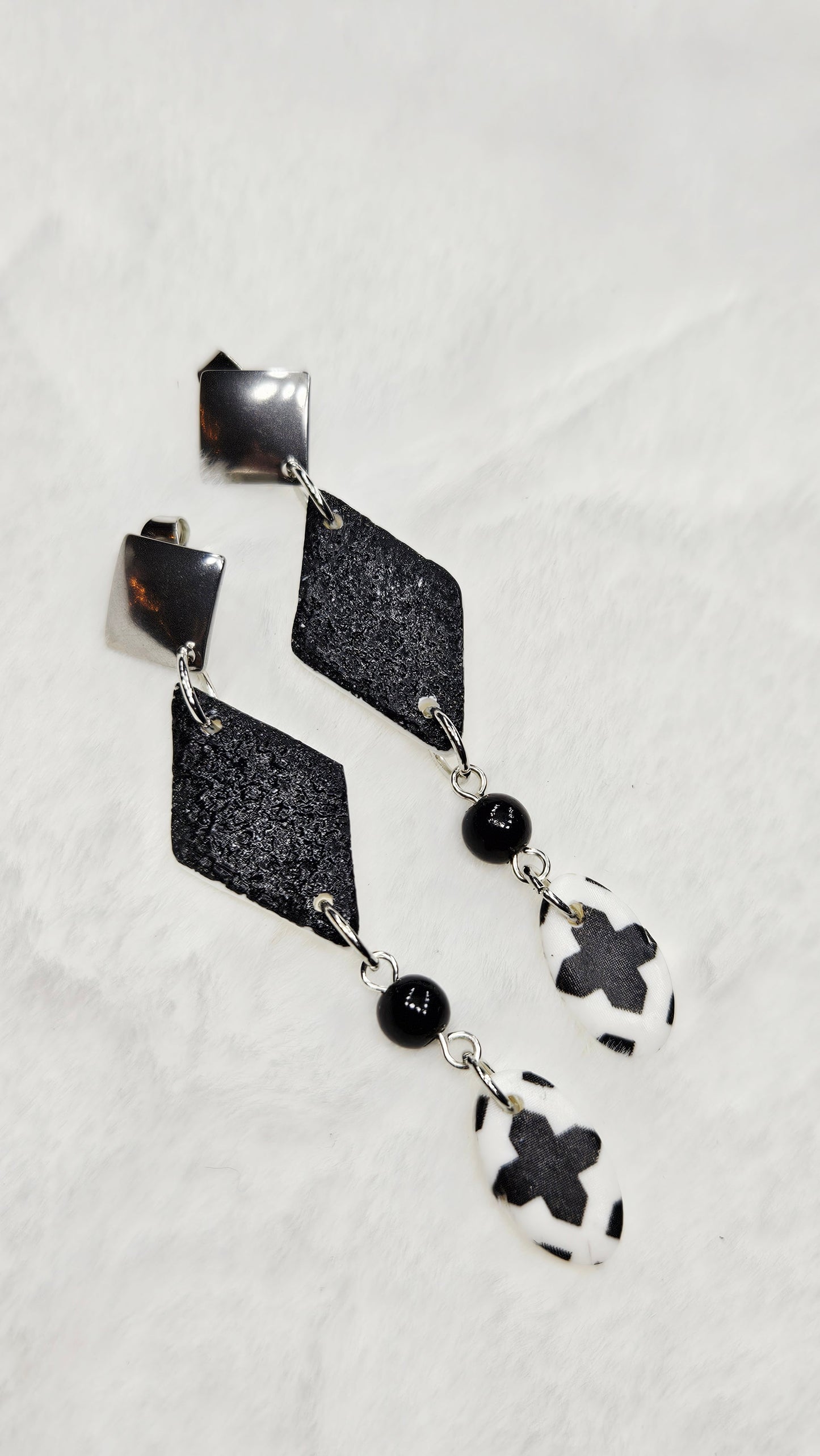 Monochrome Clay Black Kites Dangle Earrings with Cross Print Oval Buttons