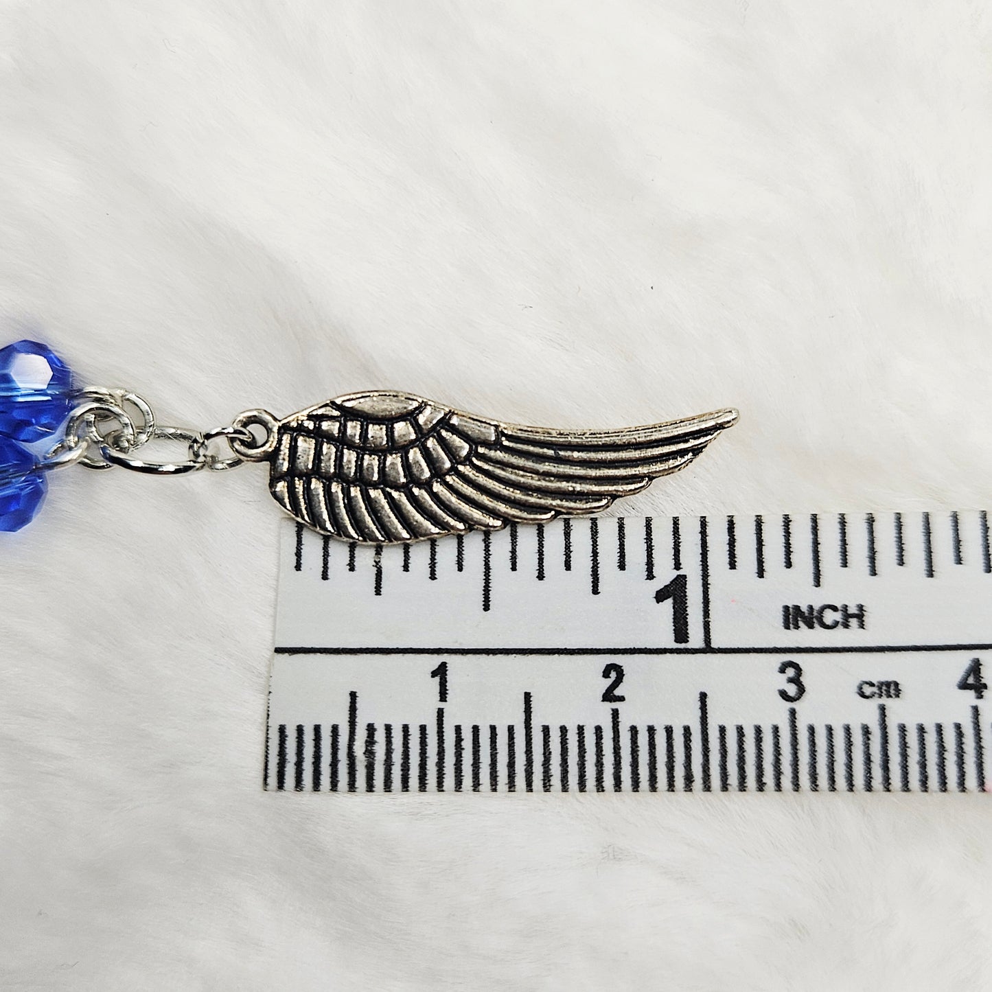 Silver Wing Charm Bracelet with Blue Crystals