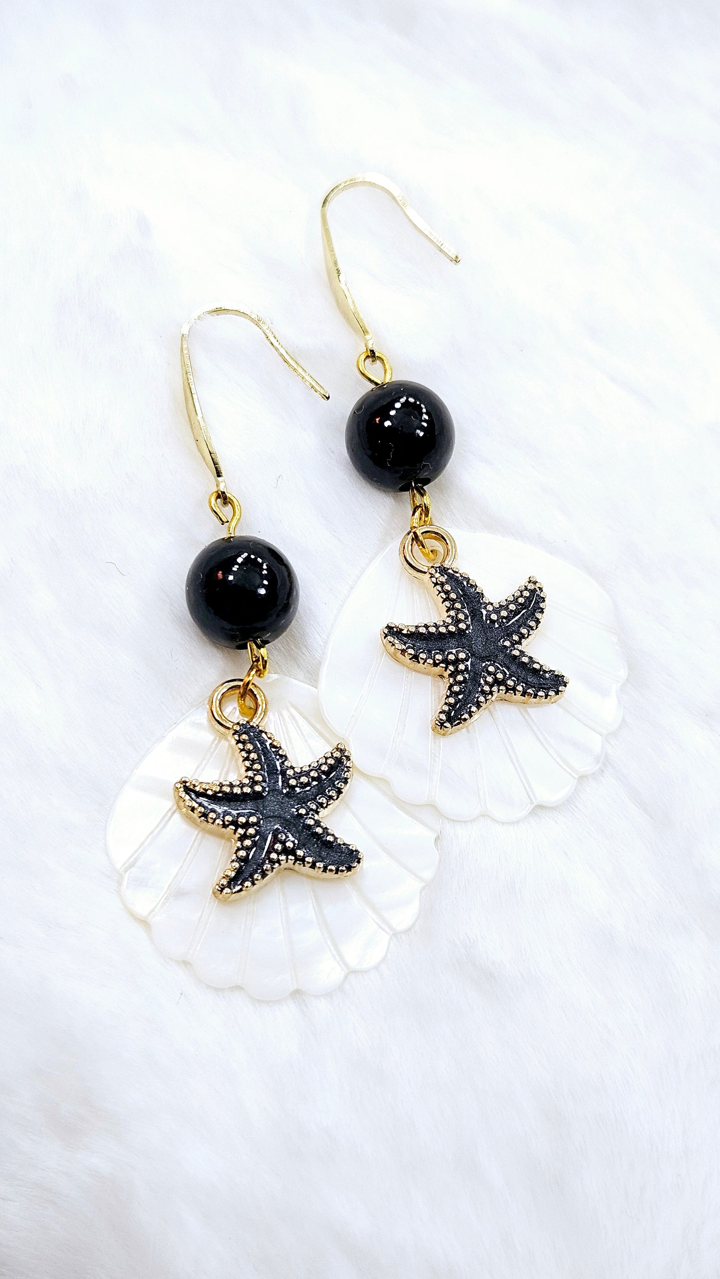 Calming Clams & Black Starfish: Pearlescent Clam Shells with Black Starfish Charms Dangle Earrings