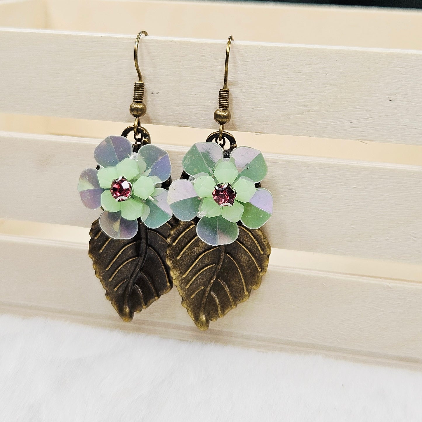 Brass Leaf Earrings with Light Green Iridescent Flowers