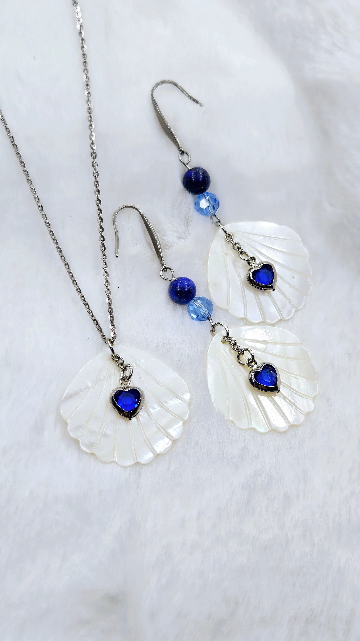 Heart of the Ocean Shell Set: Pearlescent Seashell Pendant Necklace & Earrings with Blue Gem Hearts