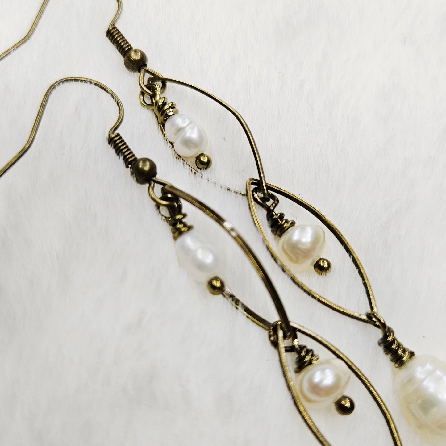 Long Antiqued Brass Oval Links with a Trio of Creamy Freshwater Pearl Dangles