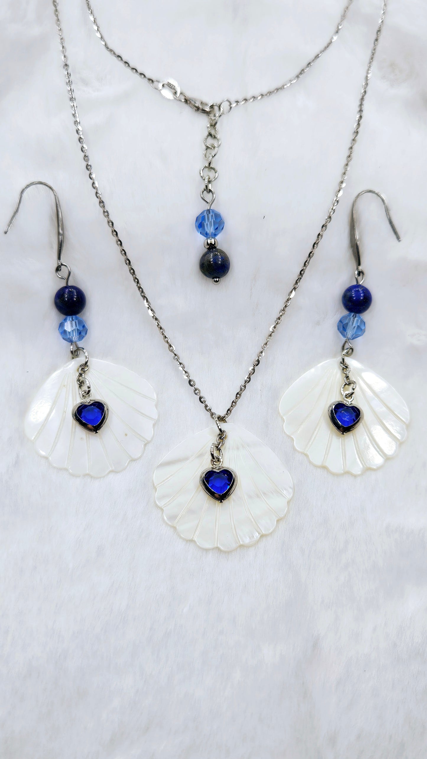 Heart of the Ocean Shell Set: Pearlescent Seashell Pendant Necklace & Earrings with Blue Gem Hearts