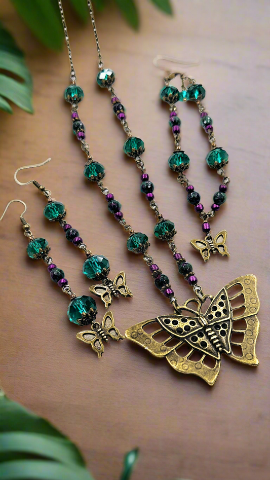 Large Brass Butterfly Pendant Necklace, Earrings & Bracelet with Emerald Austrian Crystals and Purple Accent Beads