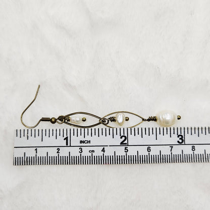 Long Antiqued Brass Oval Links with a Trio of Creamy Freshwater Pearl Dangles