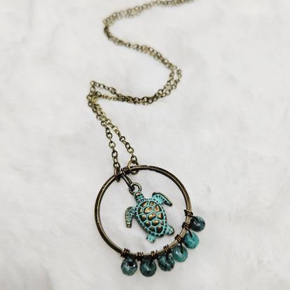 Aged Brass Sea Turtle and Blue Dalmation Jasper Necklace