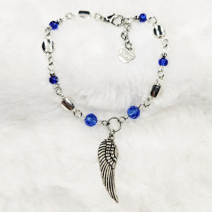 Silver Wing Charm Bracelet with Blue Crystals