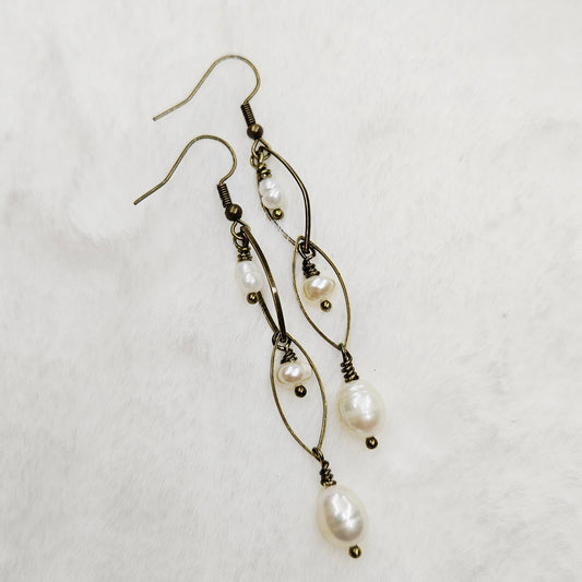 Long Antiqued Brass Oval Links with a Trio of Creamy Freshwater Pearl Dangles