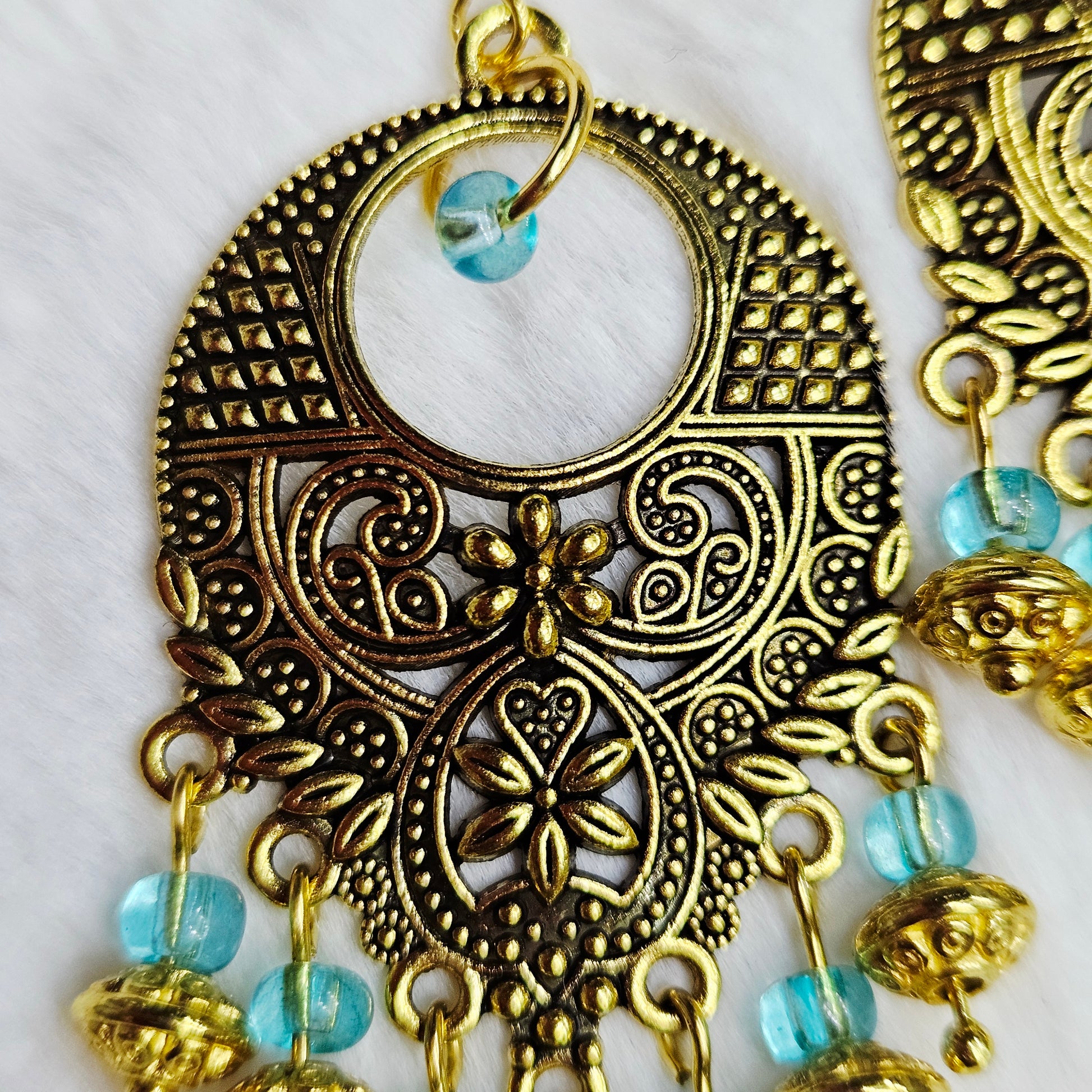 Bali Style Brassy-Gold Chandelier Earrings in Light Blue glass