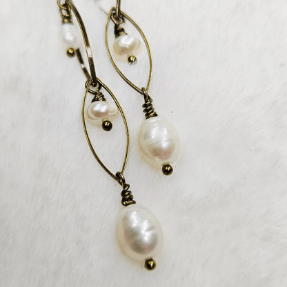Long Antiqued Brass Oval Links with a Trio of Creamy Freshwater Pearl Dangles