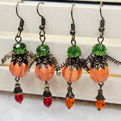 Orange "Pumpkin Men" Earrings with Crystal Teardrop Dangles on Brass