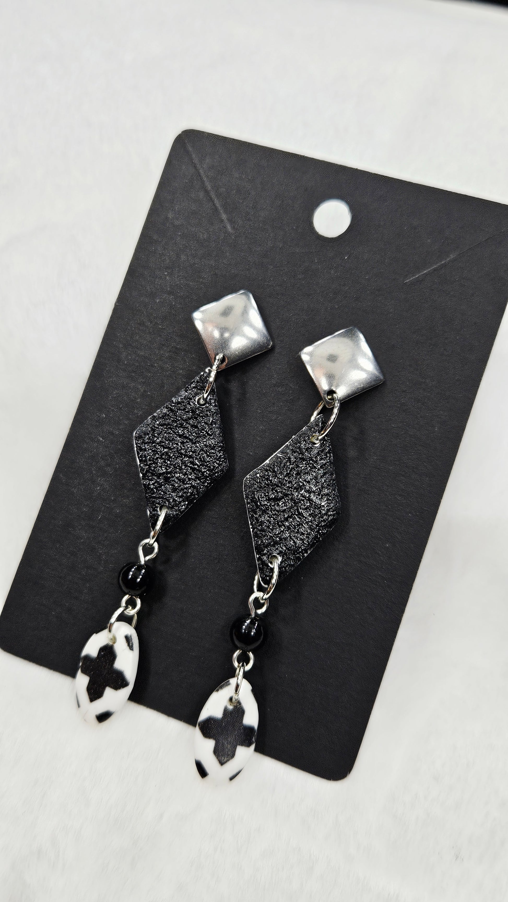 Monochrome Clay Black Kites Dangle Earrings with Cross Print Oval Buttons 
