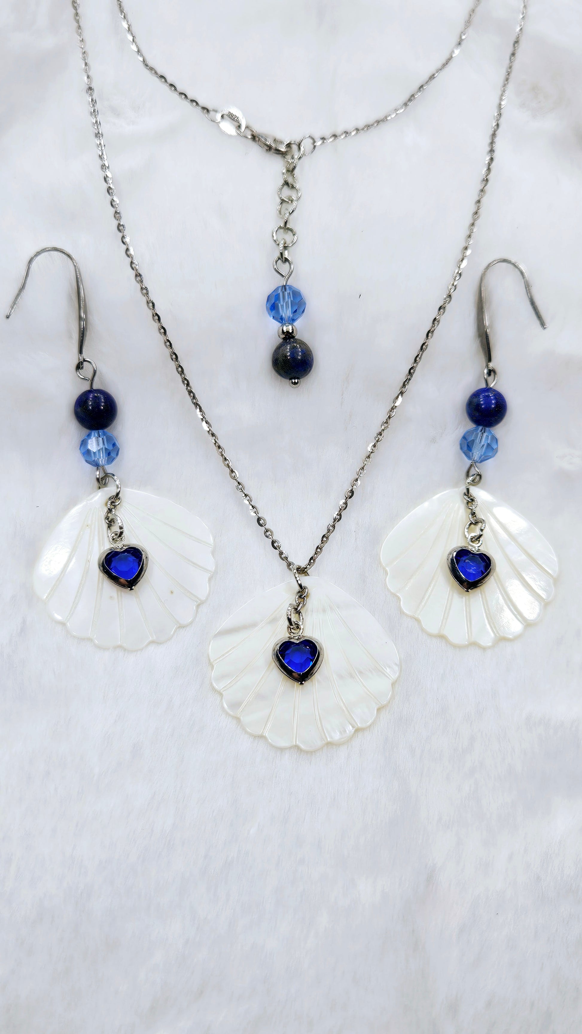Heart of the Ocean Shell Set: Pearlescent Seashell Pendant Necklace & Earrings with Blue Gem Hearts